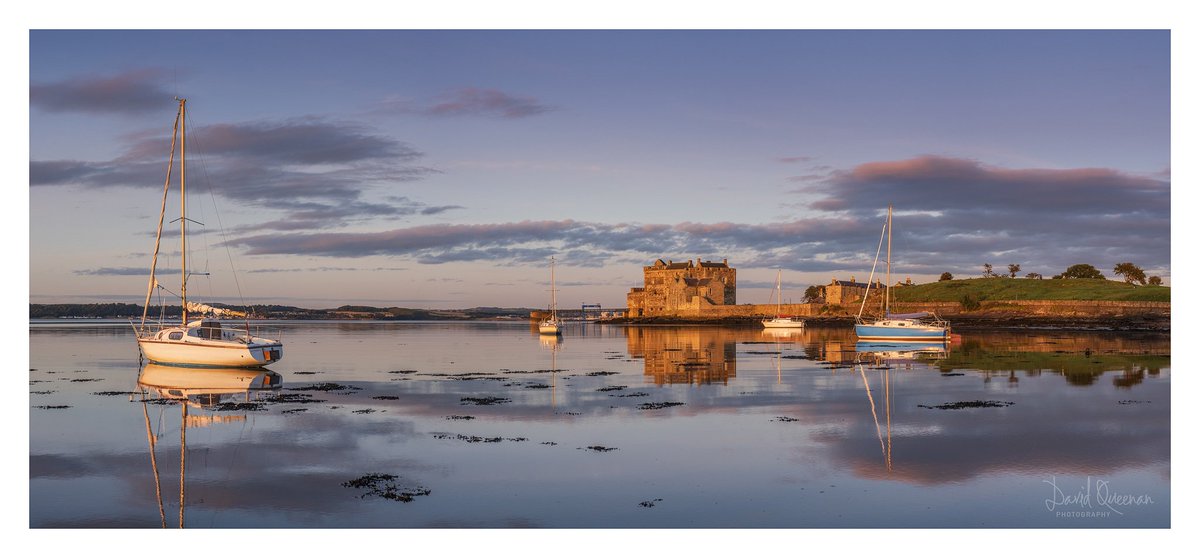 Blackness Castle bathed in golden light at sunset: Panoramic image - best viewed large! <a href="/ScottishField/">Scottish Field</a> <a href="/ScotsMagazine/">ScotsMagazine</a> <a href="/VisitScotland/">VisitScotland</a> <a href="/welovehistory/">Historic Scotland</a> #Outlander @FujifilmX_UK #appicoftheweek <a href="/opoty/">Outdoor Photography</a> <a href="/SocietyScottish/">Society of Scottish Landscape Photographers</a> <a href="/sastal01/">Scotland As Seen Through A Lens (SASTAL)</a> #ScotlandIsNow