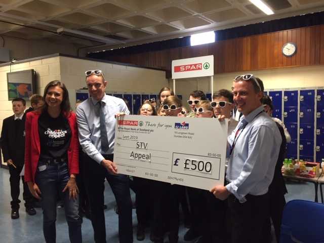 SPARScotland's tweet image. Great fun at Monifieth High School last week. All in support of the STV Appeal which is a fantastic cause. Some of our team are pictured here donating £500 to the appeal. #supportinglocalcommunities