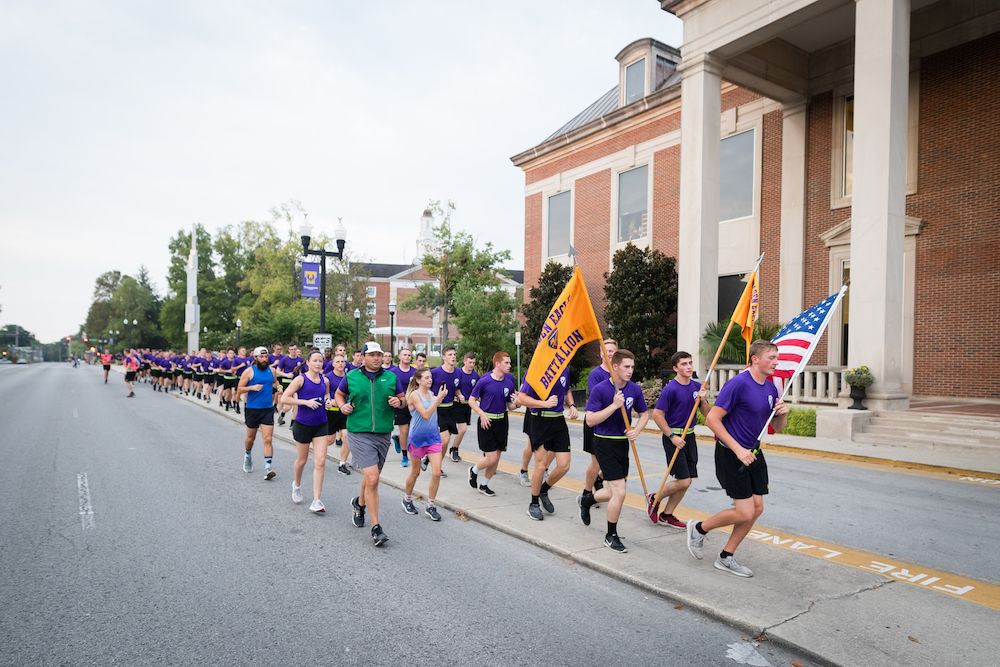tennesseetech's tweet photo. From sunrise to sunset, the cadets of the Army ROTC Golden Eagle Battalion are continuously running with the American flag, in tribute to those lost in the September 11, 2001 attacks. 🇺🇸 If you see them, feel free to join them. #September11th #NeverForget #WeAreTNTech https://t.co/0mnKD266rd
