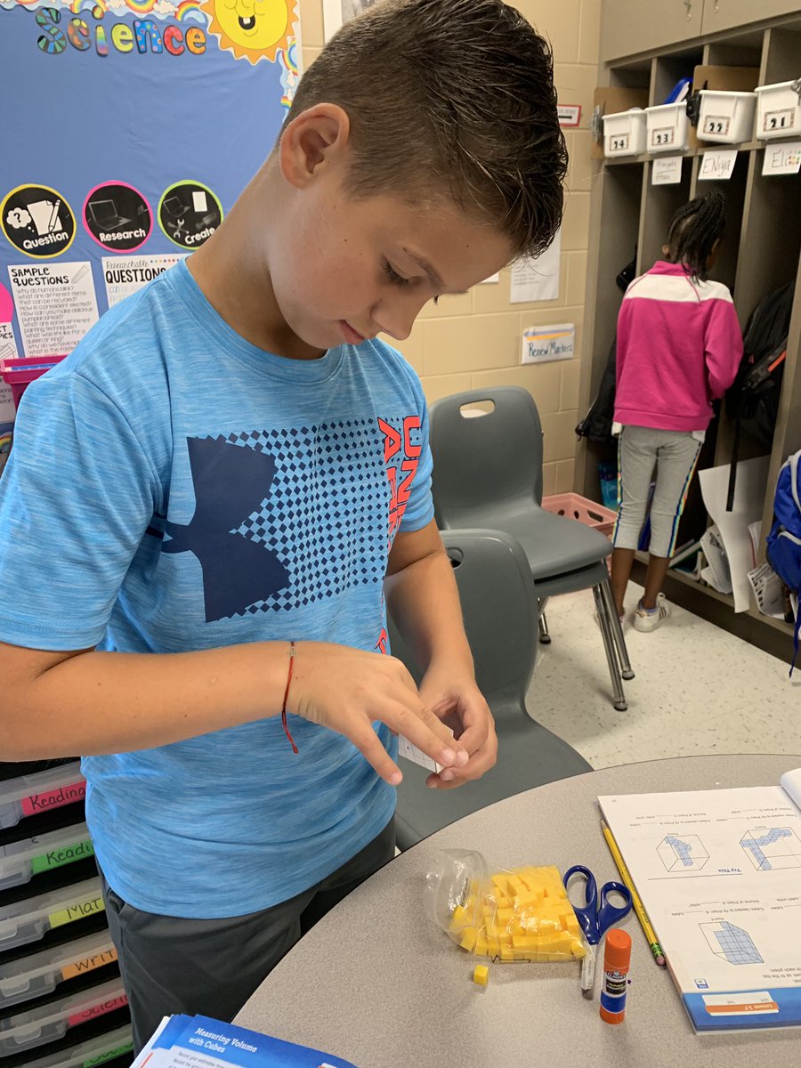 MrsReidBEU's tweet photo. We’re busy estimating &amp; measuring the volume of rectangular prisms this morning!! @BeulahRalphElem https://t.co/znYOBhUYjk