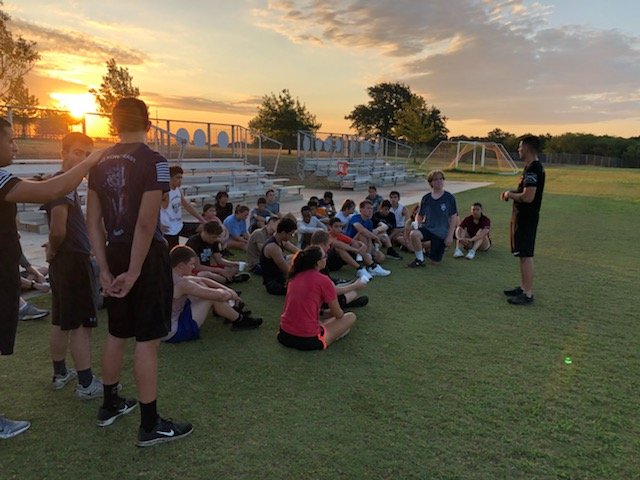 Johnson JROTC Raiders team morning  PT--- lead by Marine Corps Recruiters. After words After Action Review about pushing through muscle fatigue.