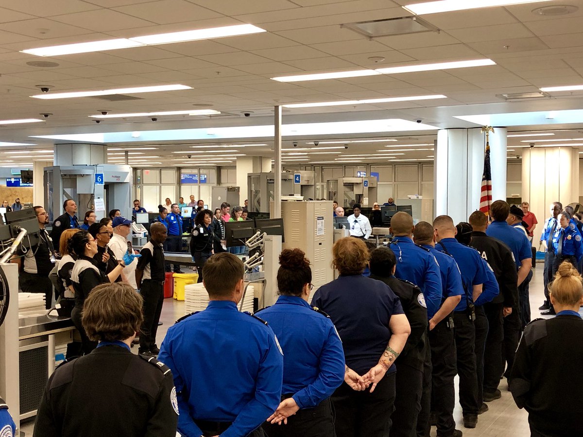 MCO's tweet photo. In remembrance of the events from 18 years ago, a moment of silence was held at 8:46 am in the terminal to honor the lives lost on September 11, 2001. We will #NeverForget. https://t.co/DEVXLVp8Vn