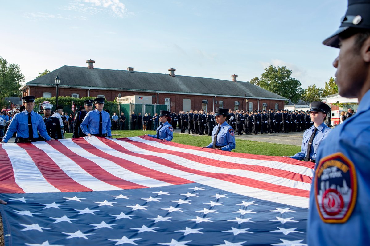 FDNY's tweet photo. #FDNY members remember those who made the Supreme Sacrifice 18 years ago today, and those who have died from illness related to the World Trade Center rescue and recovery efforts, at the September 11th Commemoration Ceremony at the FDNY EMS Training Academy #NeverForget https://t.co/wCJ2MrWj8U