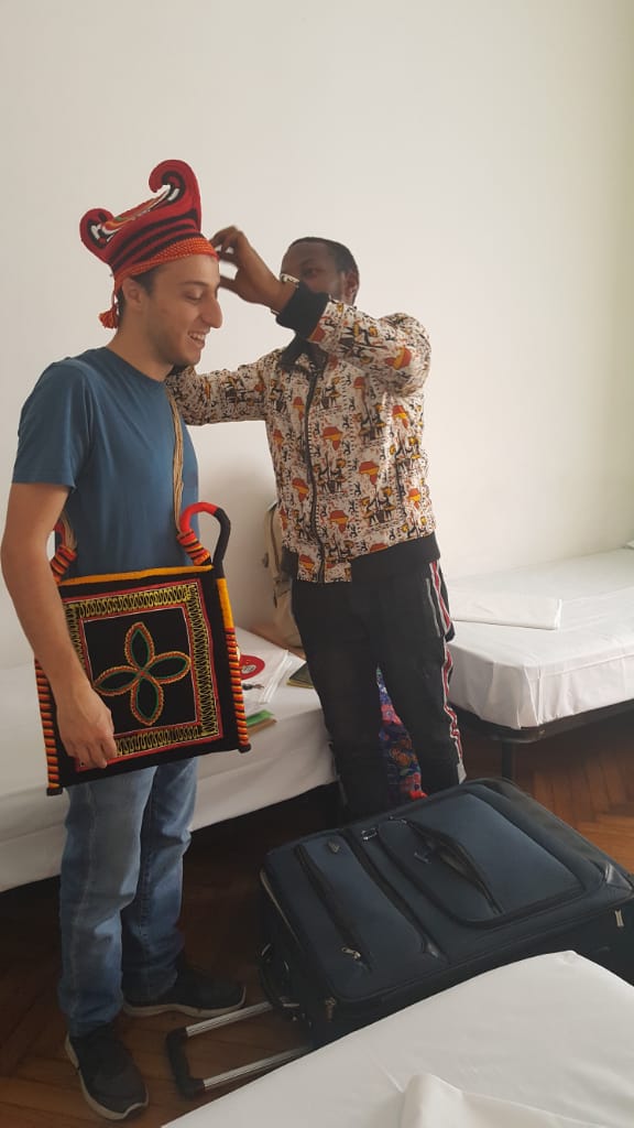 OpenDreamsOrg's tweet photo. Ndum Zavier Ndum arrives Milan, Italy to study Nuclear Engineering at the Masters Level at the Politecnico Di Milano.
Upon arrival, he handed the Cameroonian traditional regalia to members of the team in Italy who supported him
#HALIAccessNetwork
#HigherLifeFoundation https://t.co/fPLjHD28JY