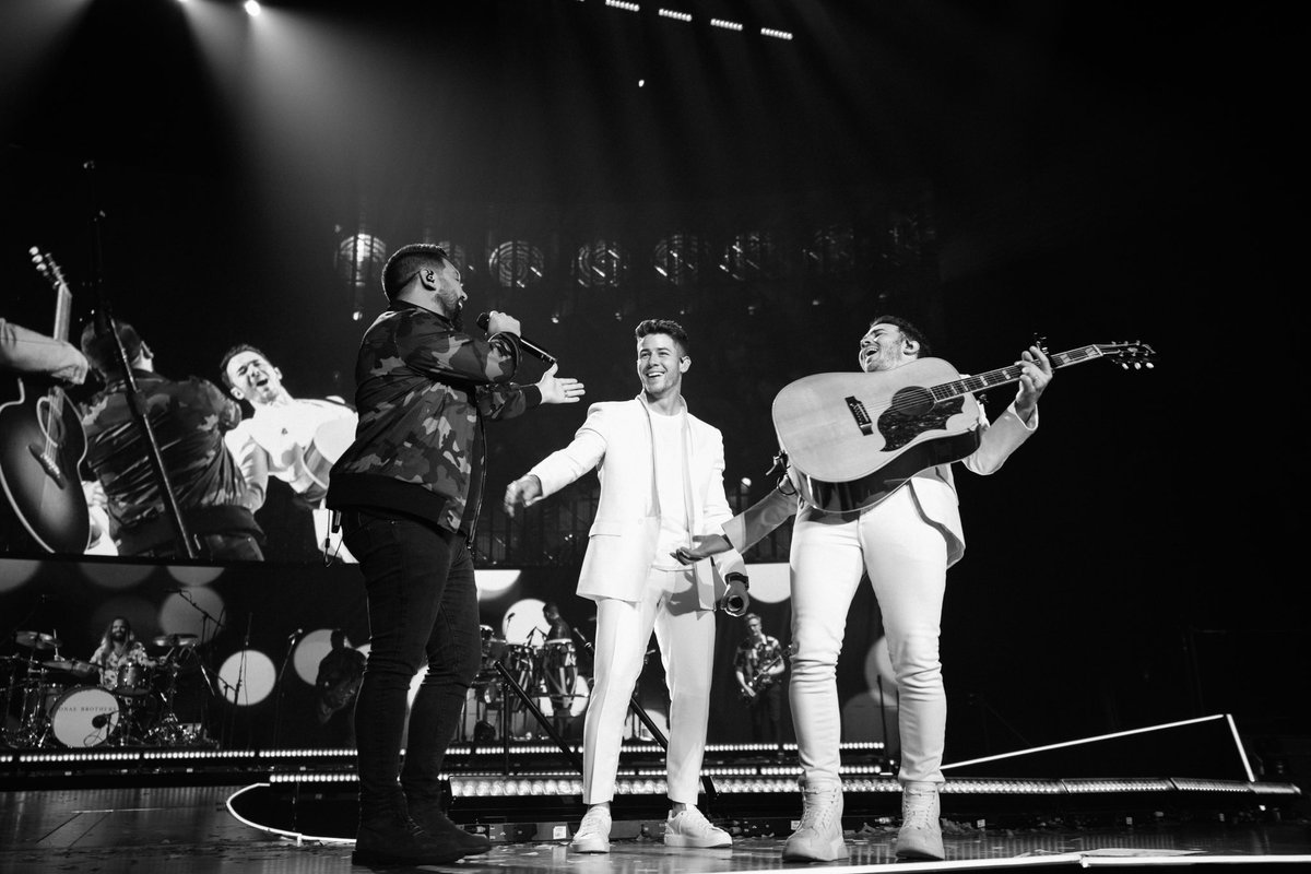 jonasbrothers's tweet photo. Nashville!! What a night on a Broadway. Thank you @danandshay for joining us on stage and to everyone who came out to the show! The comeback signs had us like 🥺🥺🥺 #happinessbeginstour https://t.co/6Yq51Efiuk