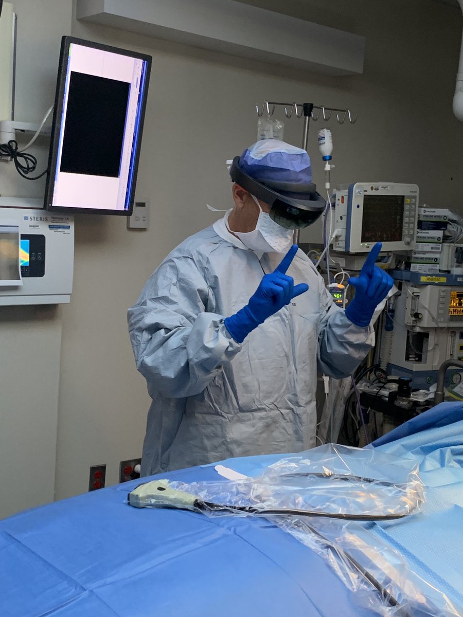 emmacfields's tweet photo. Chairman Dr. Doug Arthur and Chris McLaughlin (PGY-5) using the HoloLens VR for a breast interstitial implant for real-time visualization of the target and relevant anatomy #ThisIsBrachytherapy #brachy #brachytherapy #radonc @VCUMassey @VCUHealth @lipidomics_us https://t.co/B3KqBuWyL4