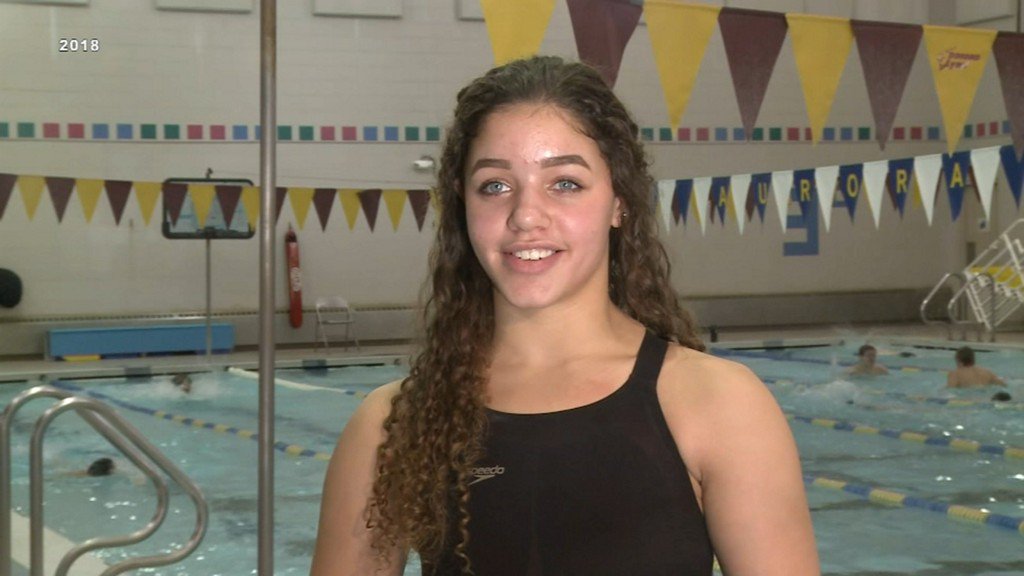 Decision reversed on high school swimmer disqualified over swimsuit. 