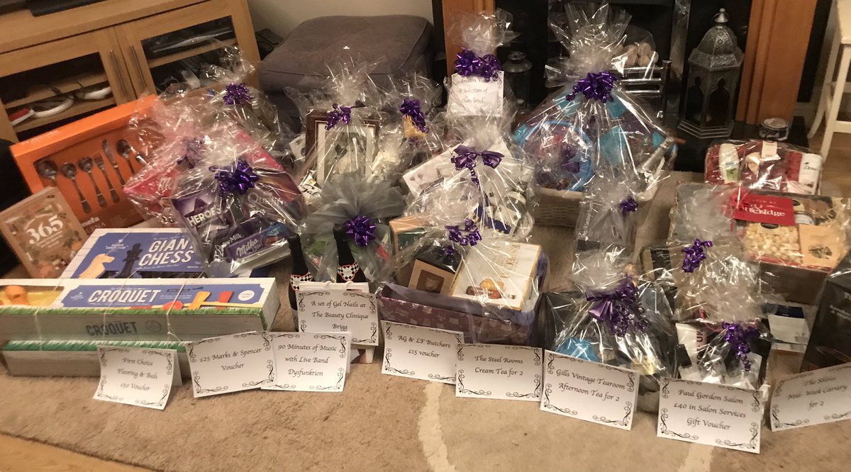 sazza773's tweet photo. Raffle prizes all  wrapped by @ingyKL , helped by Jamie , Alice and myself tonight ready for @TheStrokeAssoc charity ball on 14th Sept @ForestPinesDTbH . Overwhelmed by the generosity of local businesses and people . If you didn’t buy tickets , look at what you could have won 💜 https://t.co/8l9DUdUjyl