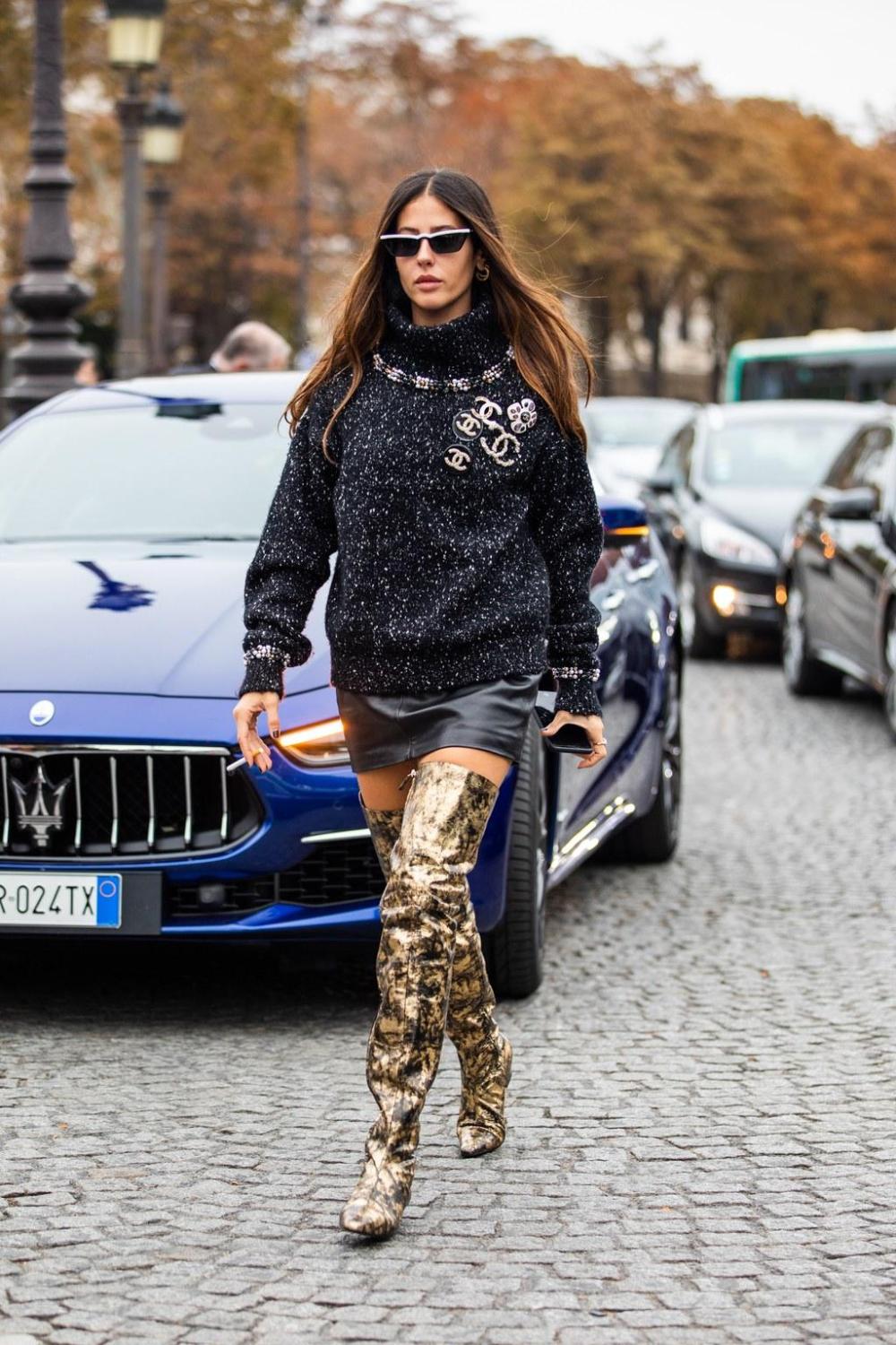 Vogue France on X: Gilda Ambrosio owning the streets of Paris in Chanel.  We want a pair of those gold knee-high boots. --->   © Sandra Semburg  / X