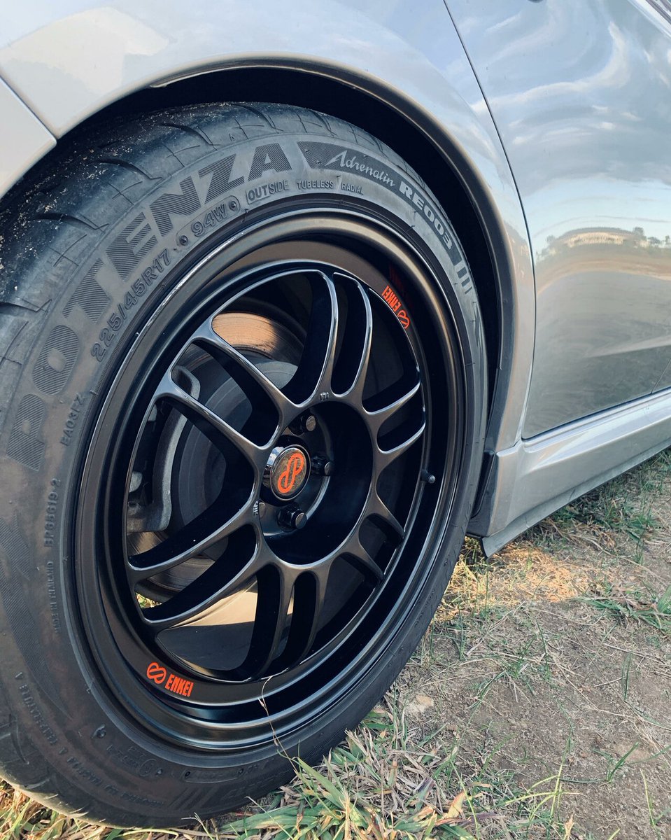 FlatOutGraphics's tweet image. The classic. Flat Out Graphics center caps with red on black. Visit flatoutgfx.com to get some for your #rpf1s