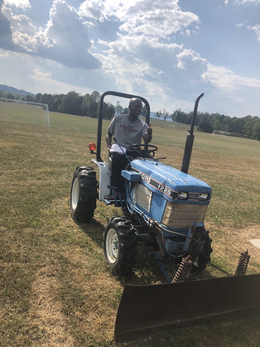 First practice at Loving Field.  Sirak on a tractor?  Is it a Siraktor?