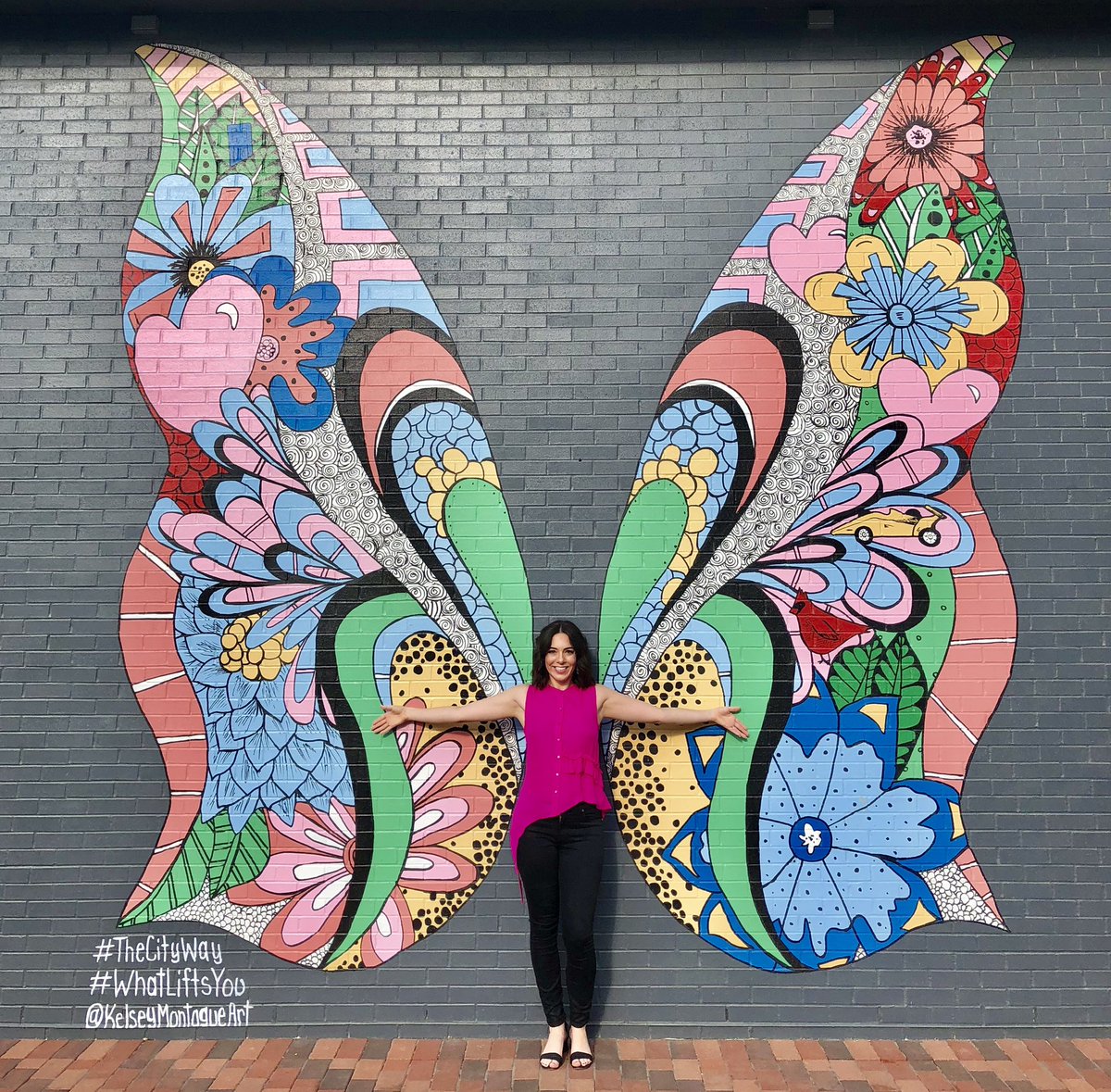 karleecemo's tweet photo. I was extremely excited to recognize the mural by @kelsmontagueart across from our hotel in Indy because of a similar mural she painted for @taylorswift13. Obviously, I needed a picture. #WhatLiftsYou #StudyMission19 https://t.co/CSXA6245IF