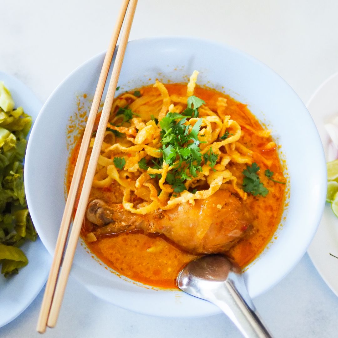 Khao Soi Maesai serves perhaps the best khao soi in Chiang Mai. Although there will always be a discussion who's the best in town, it's no secret that the famous restaurant serves incredibly tasty Khao Soi. You should definitely put it on your must-visit list! #khaosoi #thaifood