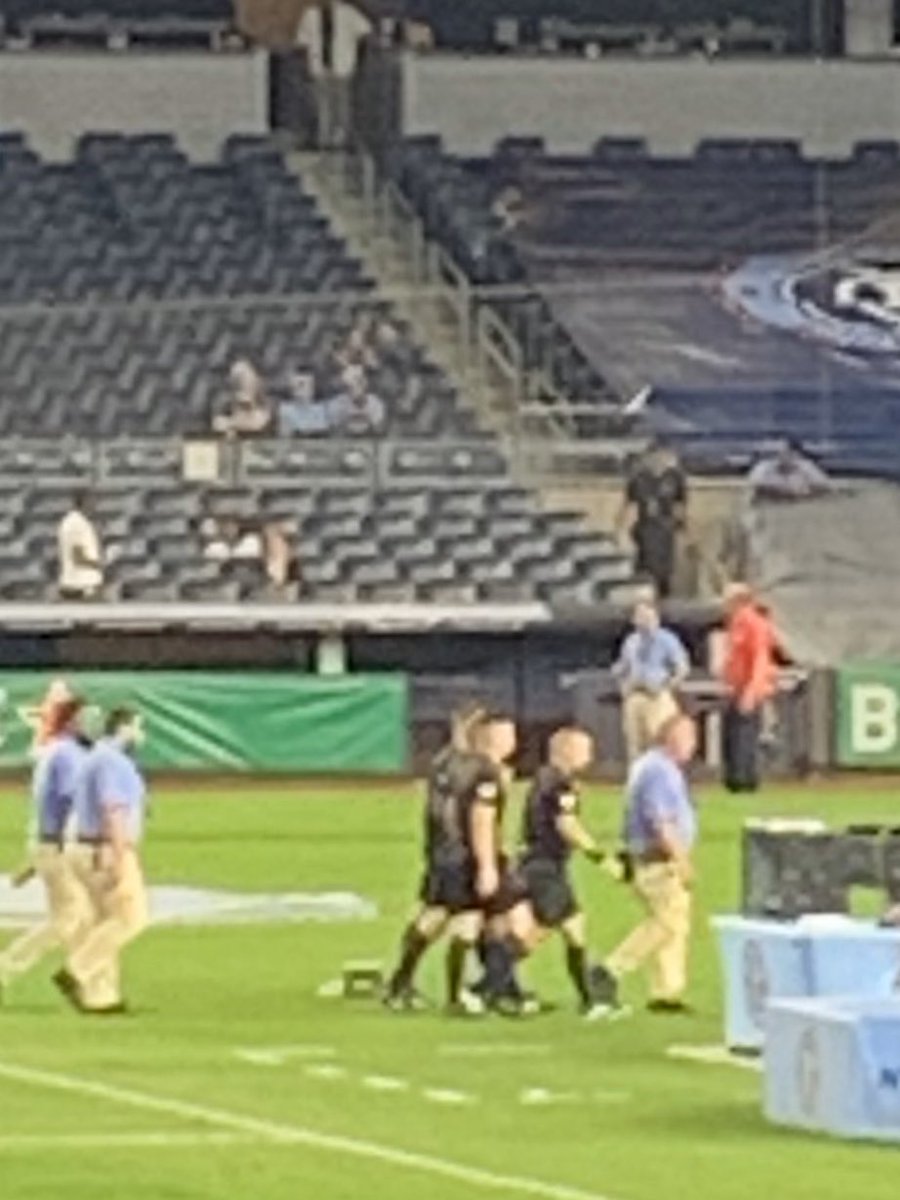 ferryvanlier's tweet image. After a terribly bad decision from the ref, he is escorted out under protection #NYCFC #badref #nycfcvtoronto #NeverForget