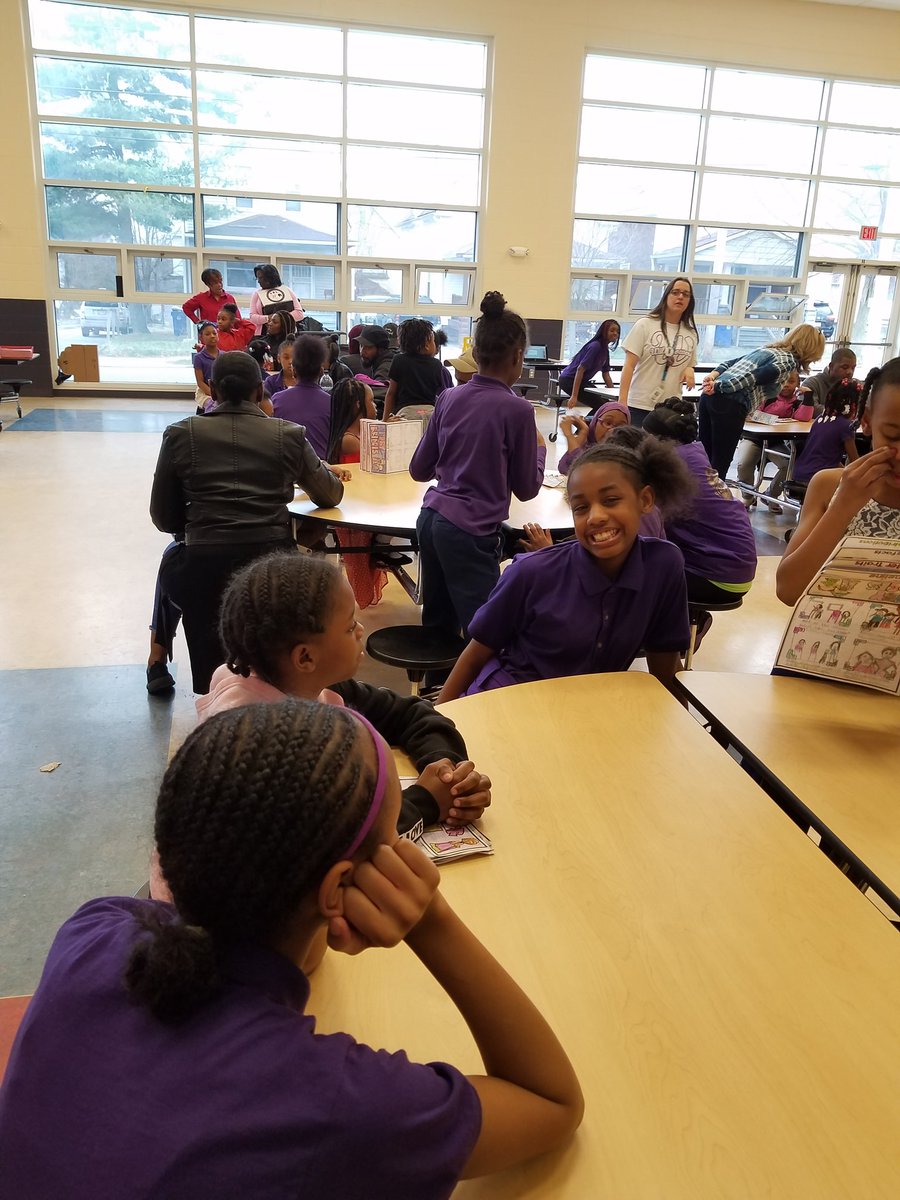 FACE_Carla's tweet photo. Warner GLA Scholars literary presentations highlighting Michelle Obama's book.  Thay are becoming!  @FACE_CMSD @EricGordon_CEO @CLEMetroSchools https://t.co/BX07vsI272