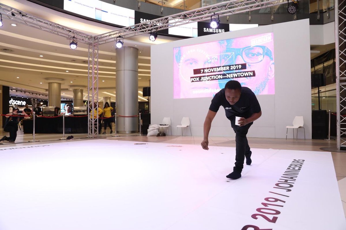 SISessions's tweet photo. #HiBlackCoffee's eye coming along nicely there, a #GuinnessWorldRecords attempt of largest mosaic image using ground coffee beans. @Percy_Maimela_ is in such great spirits, what an energy! #SoundIdeaSessions https://t.co/3a3g0c4WHq