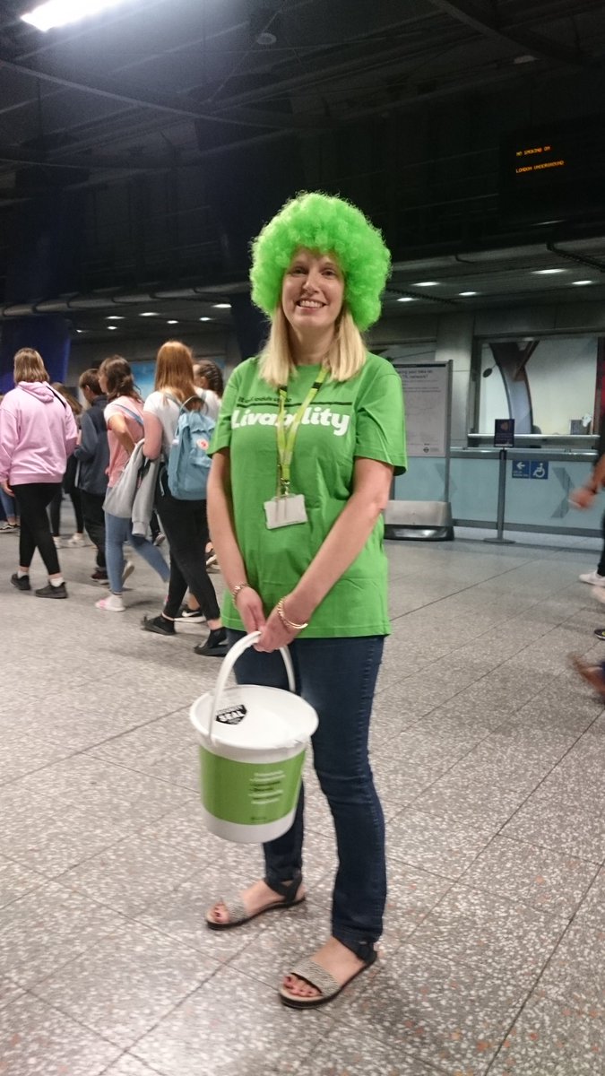 LisaHemsley's tweet photo. What a welcome to @TfL @jubileeline North Greenwich station this morn - happy smiley @LivabilityUK peeps doing their thing and collecting great amounts to support disabled people. Cracking stuff everyone...loving the green wig #northgreenwich #Donate #ThankYou https://t.co/VuZB5O5F1R