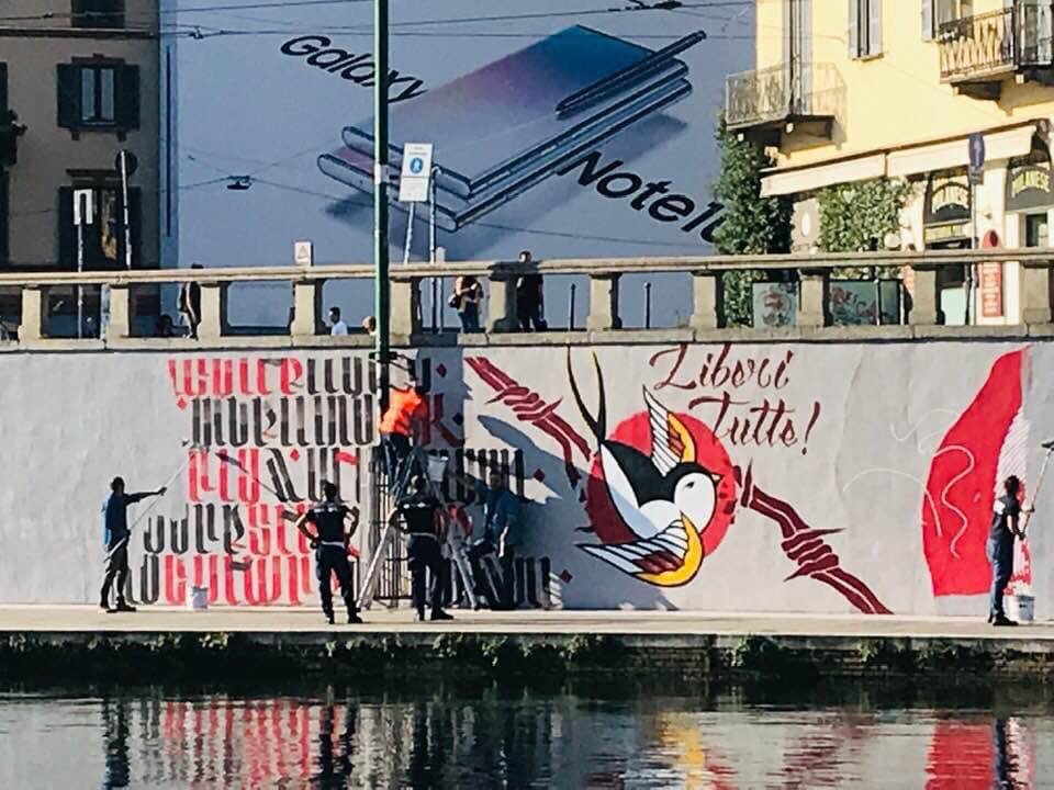 Scempio in #Darsena - Cancellato per l'ennesima volta il murales per #Dax <a href="/radiondadurto/">Radio Onda d'Urto</a> <a href="/milanoics/">MilanoX</a> <a href="/CsoaLambretta/">csoa Lambretta</a> <a href="/LUMe_occupato/">LUME - Laboratorio Universitario Metropolitano</a> <a href="/global_project/">global_project</a> <a href="/DinamoPress/">DinamoPress</a> <a href="/Muhlbauer_/">Luciano Muhlbauer</a> <a href="/alexfoti/">@alexfoti@mastodon.bida.im</a> <a href="/OffTopic_lab/">Off Topic</a> <a href="/Ri_make_/">Ri-Make</a> <a href="/MacaoTwit/">MACAO</a> <a href="/CSOA_COX18/">Csoa Cox18</a> <a href="/Cantiere/">Cs Cantiere</a>