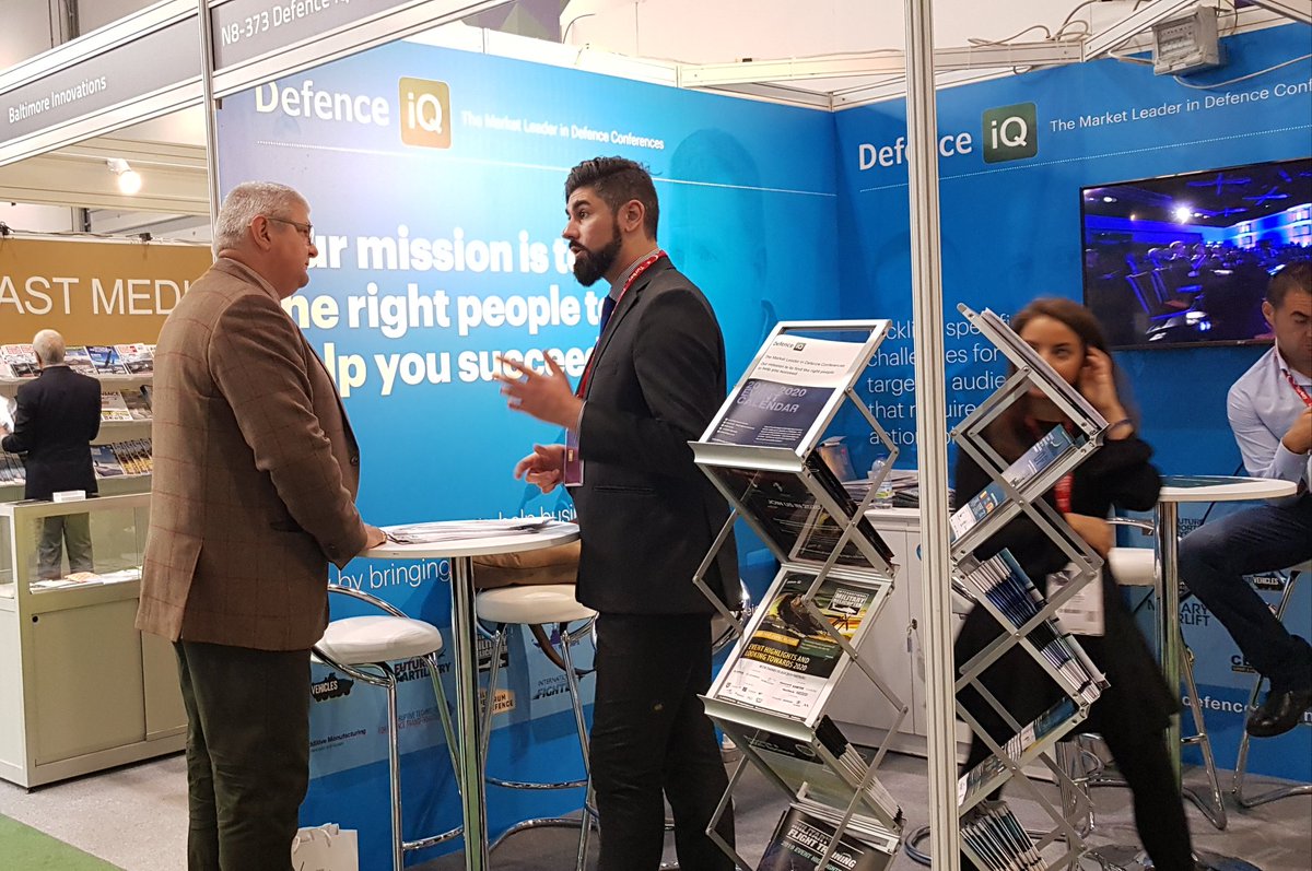 EIqpc's tweet photo. Anthony Wilkinson Commercial Lead at Defence IQ catching up with Mark Mears Managing Director, Meggitt Training Systems. Meet the team at #dsei stand N8-373 #training #defence #military  #livefiresolutions # https://t.co/DSd1i9pbwh