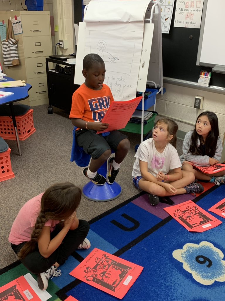 MrsMorrisFHES's tweet photo. One of their favorite parts of Writing Workshop- sharing their writing! @FortHuntES #fhesfoxes https://t.co/tWZ4v7x2Ki