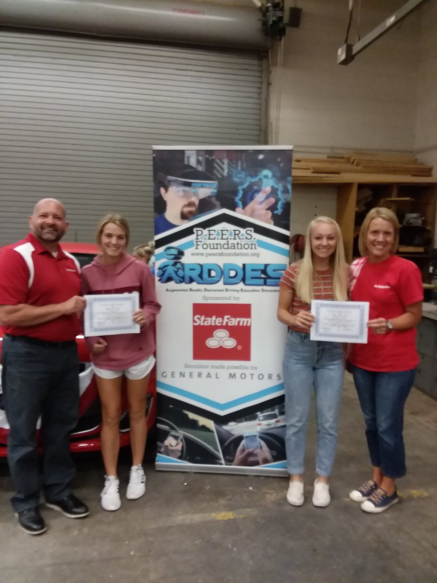 PEERSFdn's tweet photo. Students at @McCutcheonHS receive Certificates of Completion after experiencing our Augmented Reality Distracted Driving Education Simulator (ARDDES) and sign the pledge to end distracted driving with @StateFarm! #Drive2N2 @SF_JimSlaven https://t.co/fdgMO24Jd2