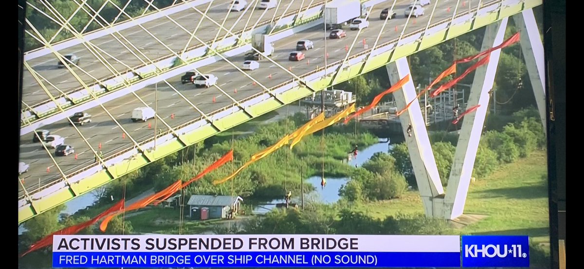 Greenpeace protesters arrested after dangling off Fred Hartman Bridge in Texas
