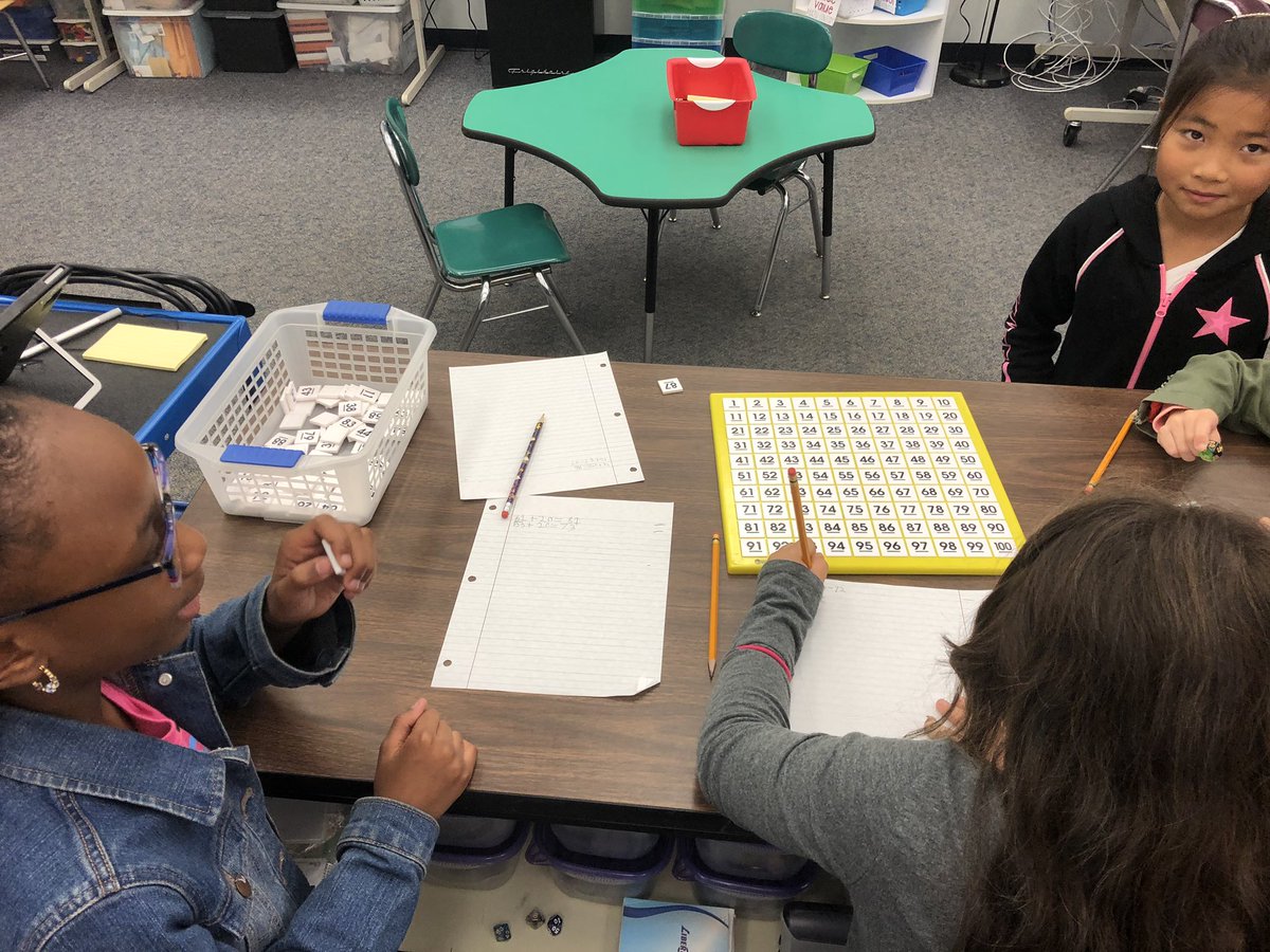 k5mathgcdisney's tweet photo. New game: Hundred Chart Treasure  Hunt. We are practicing adding a multiple of 10 to a 2-digit number. It was a hit and the kids want it to be in our rotation of games. #wds1920 #gcpride https://t.co/UA2QLMfy5W
