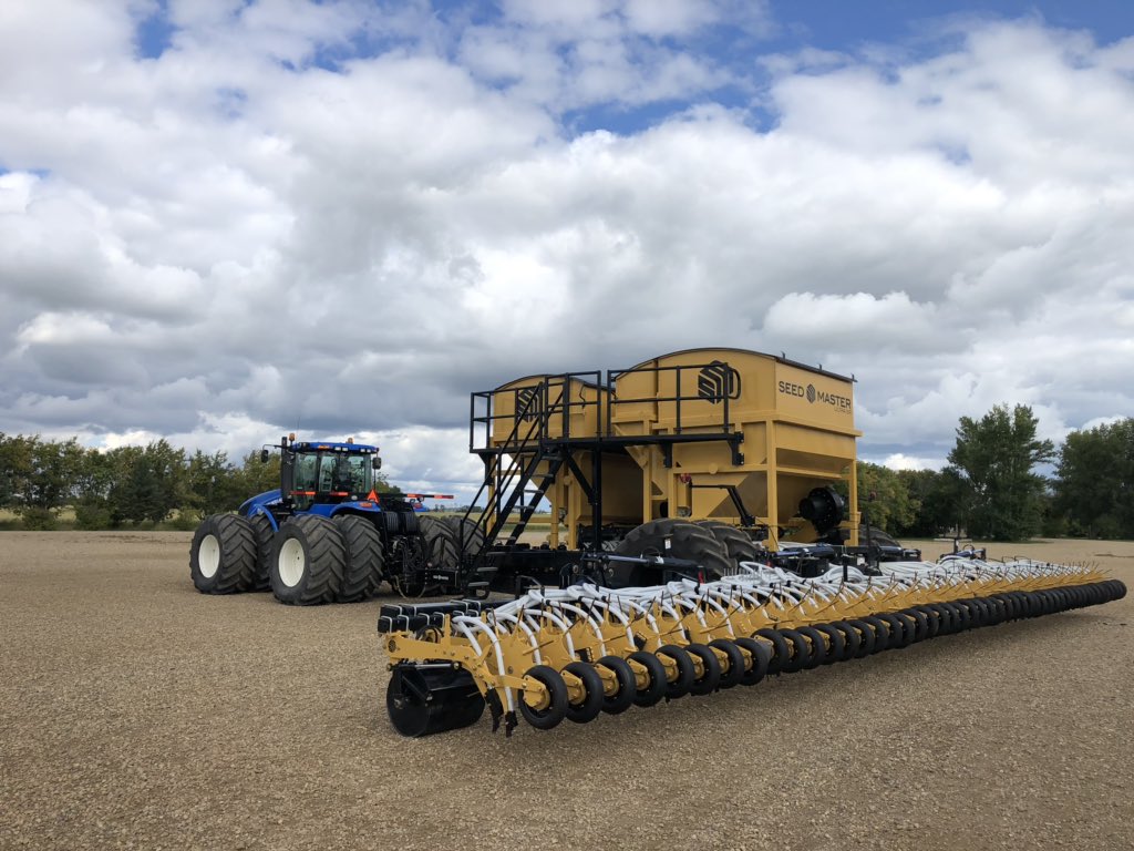 PCEfarmSALES's tweet photo. Peace Country weather is starting to clear and anxious to go drill into more pea stubble with the #UltraSR. Pulled this compact unit into the shop to add 4 #AXISCAMS from @SeedMasterMfg. #Slick #DroneDay https://t.co/n88Pf06BuI