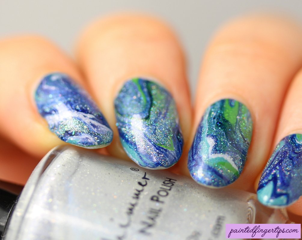 It's about time I shared another drip marble with you! For this one, I chose colours that looked like water. More details at paintedfingertips.com/2019/09/blue-a… #nailart