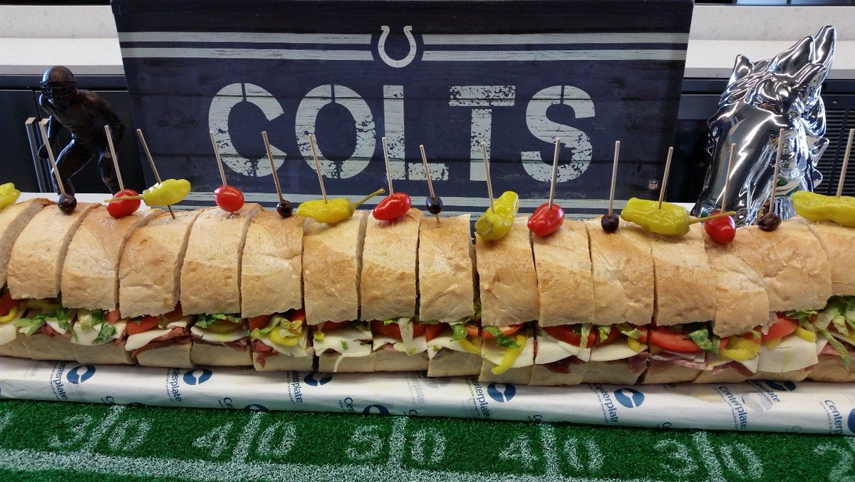 LucasOilStadium's tweet photo. Earlier today, our friends at @centerplate showcased new foods available for the @Colts' 2019 season!

Three Foot Italian Sub
Loaded Nacho Fries
Chicken Waffle Sandwich Basket
Pots &amp; Pans Pie Co. Apple Crumble Pie
(Just to name a few!) https://t.co/KL0nBkqxzD