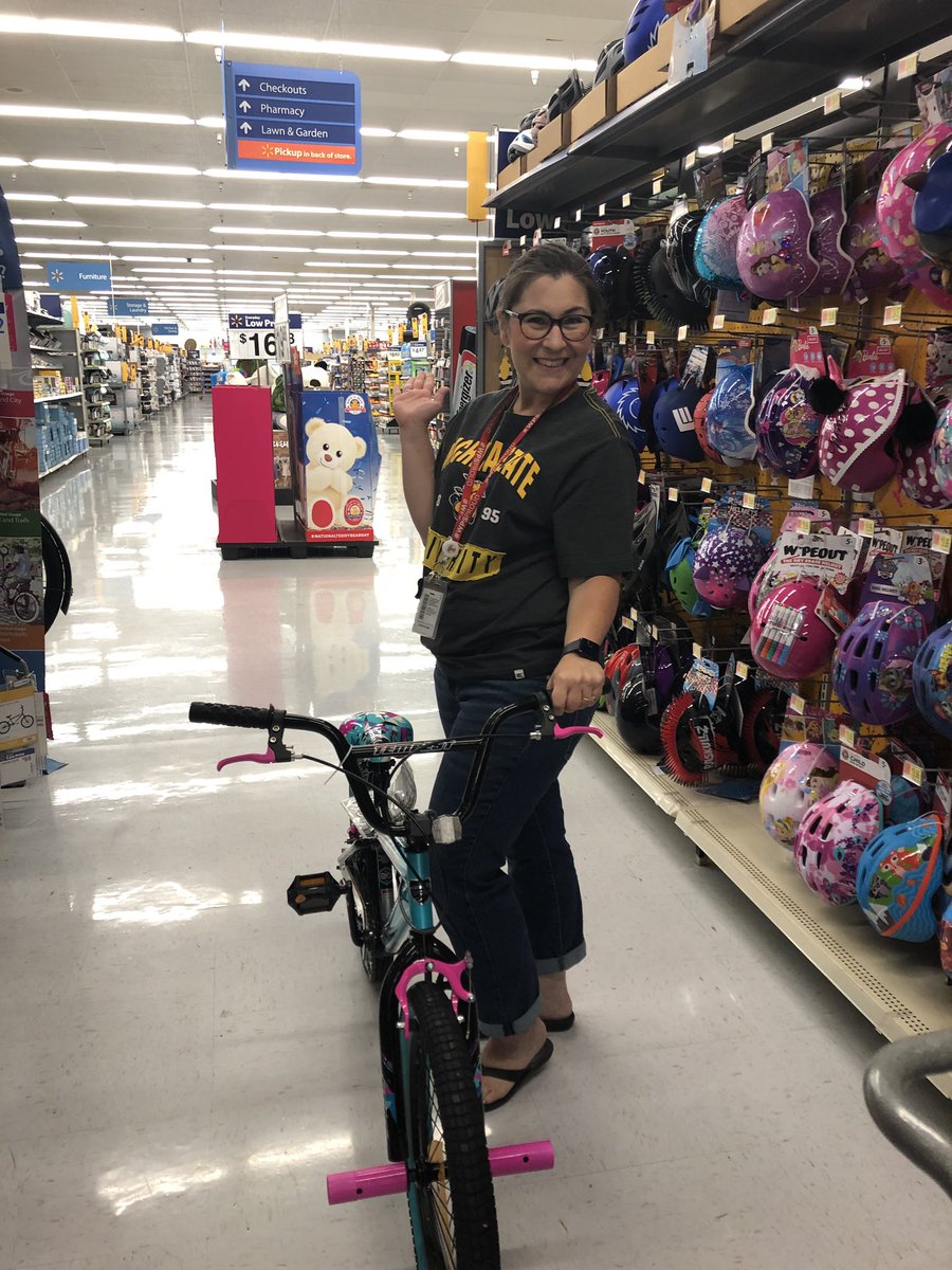 Sometimes work takes place out of the building! <a href="/techcoachjnic/">Jennifer Nicholson</a> with the new bike that will be raffled out during our <a href="/LOuvertureElm/">L'Ouverture Elem.</a> official enrollment assembly. #wpsproud