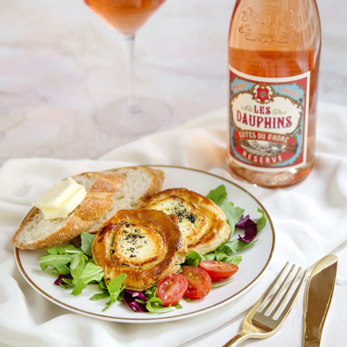 Welcome the harvest season with this miniature herb and goat cheese galette, a savory tart with farm-fresh ingredients matched perfectly with a glass of Les Dauphins Rosé.