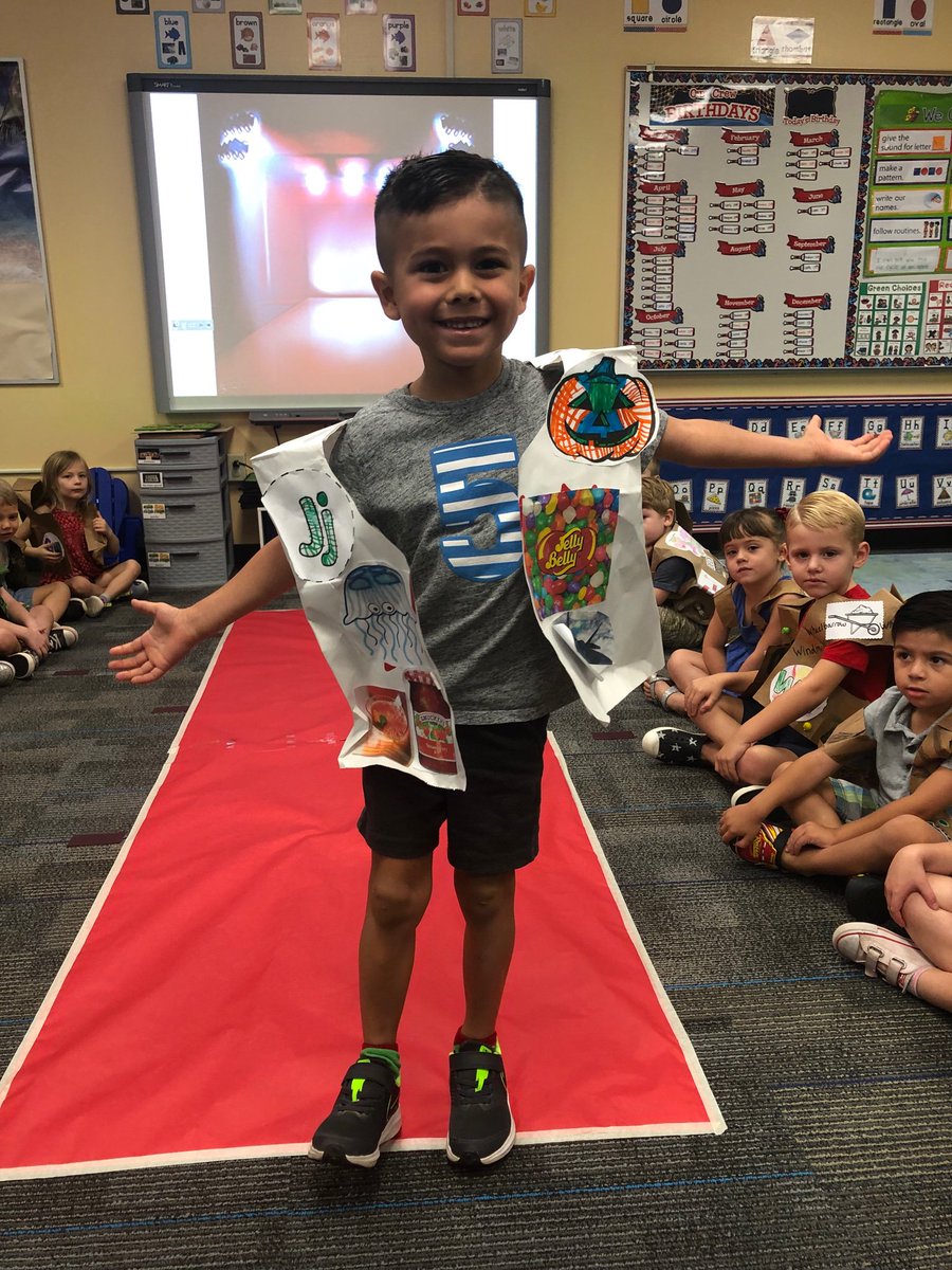 qcusd_preschool's tweet image. Check out our students walking the runway! They are modeling the letters of the alphabet and the words that start with each letter. #qcleads #excellencethroughleadership #alphabetknowledge #redcarpetfashion