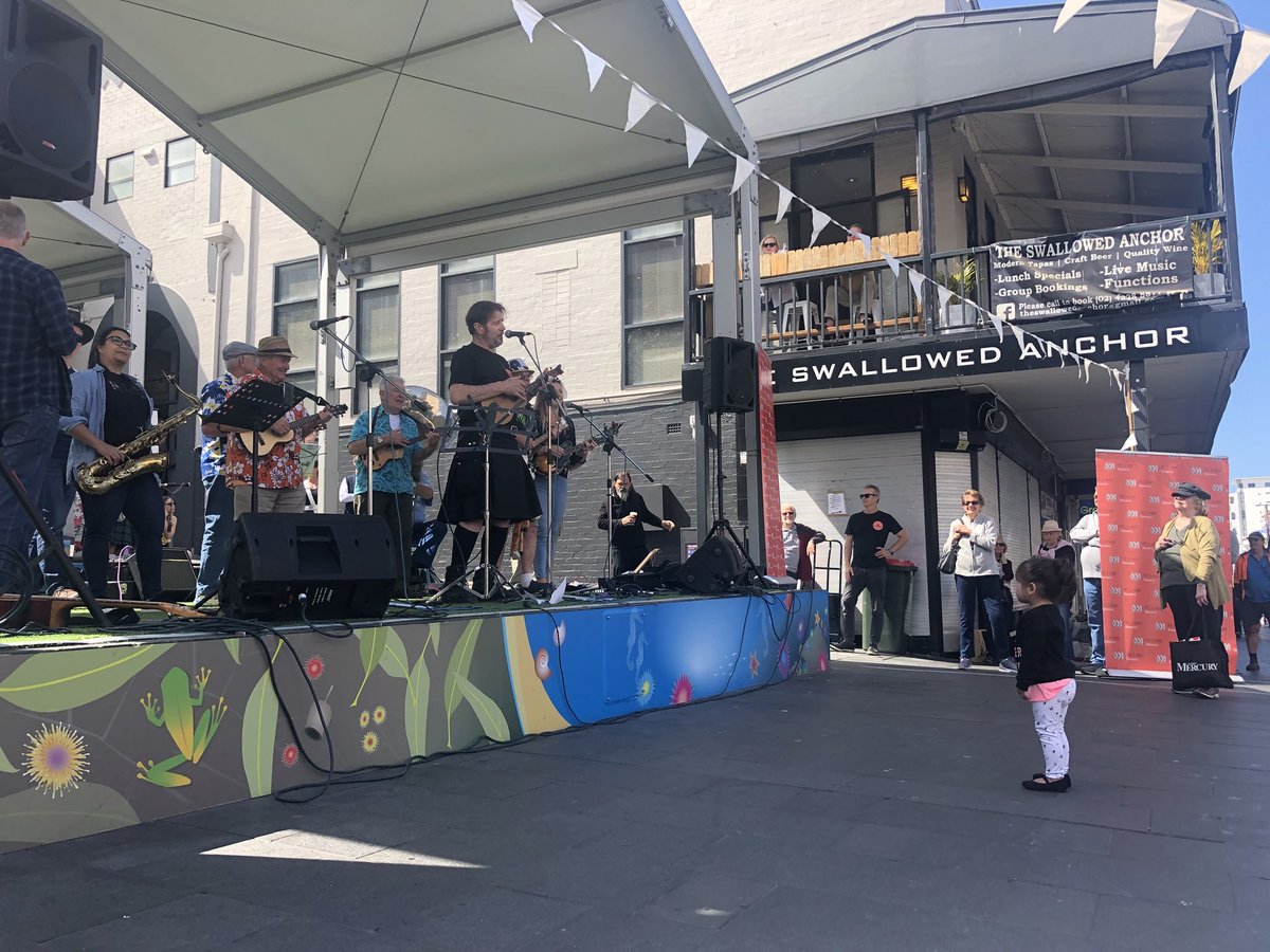 AinslieClaire's tweet photo. Crowd gathering as the #Buskoff between ABC Illawarra’s @doctormcdougall &amp; @nickrheinberger heats up in Crown Street Mall, raising funds for local Surf Life Saving clubs. https://t.co/PdFGGQSNzv