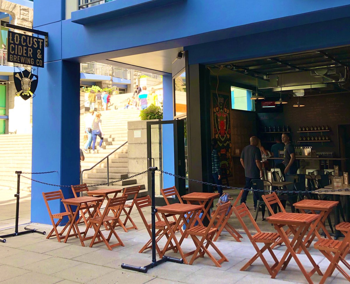 LocustCider's tweet photo. Now Open: our Post Alley Taproom! Located on #PostAlley at #HarborSteps just a stone’s throw from the #gumwall and #PikePlaceMarket, serving our usual #hardcider, #craftbeer, #wine and #ulisfamoussausages, as well as the ever popular #ciderslushies! #nowopen #postalleytaproom https://t.co/Jm6aQO7Z2A