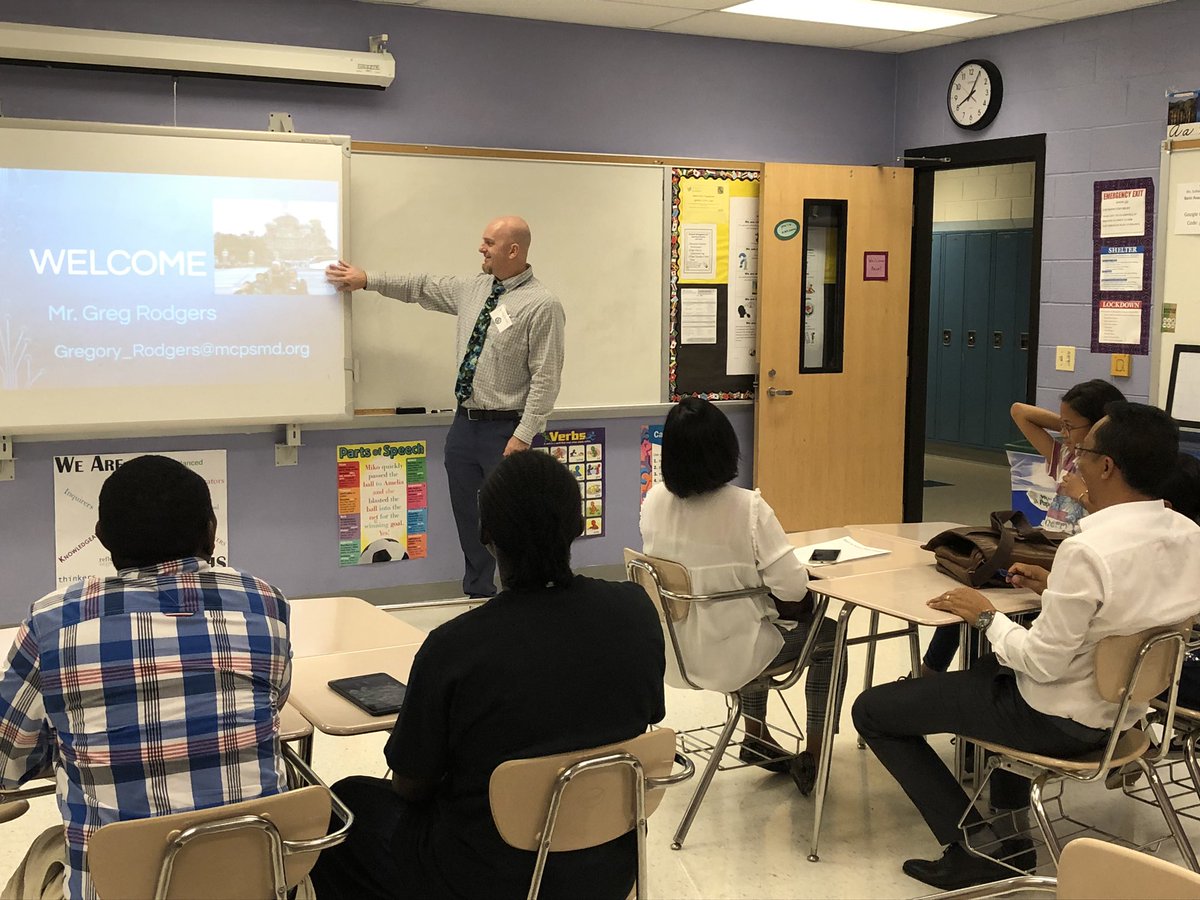 RMHS_ESOL_Dept's tweet photo. ESOL teachers and students helping parents/guardians negotiate our school system and get to know what makes ESOL special. Students looked so proud to bring their parents to classes! #ESOLpride #mcpsbtsn https://t.co/Cc4Ib26LNA