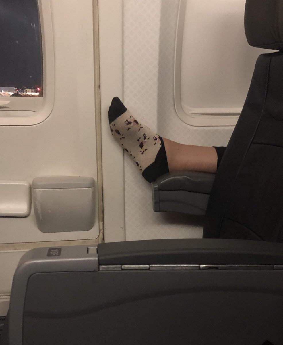 JoshKivett's tweet photo. Hereβs another rule that should be read to folks sitting in the exit row: keep your freaking shoes on and your feet in your row. #FlatNasty https://t.co/WlA3qXfw8d