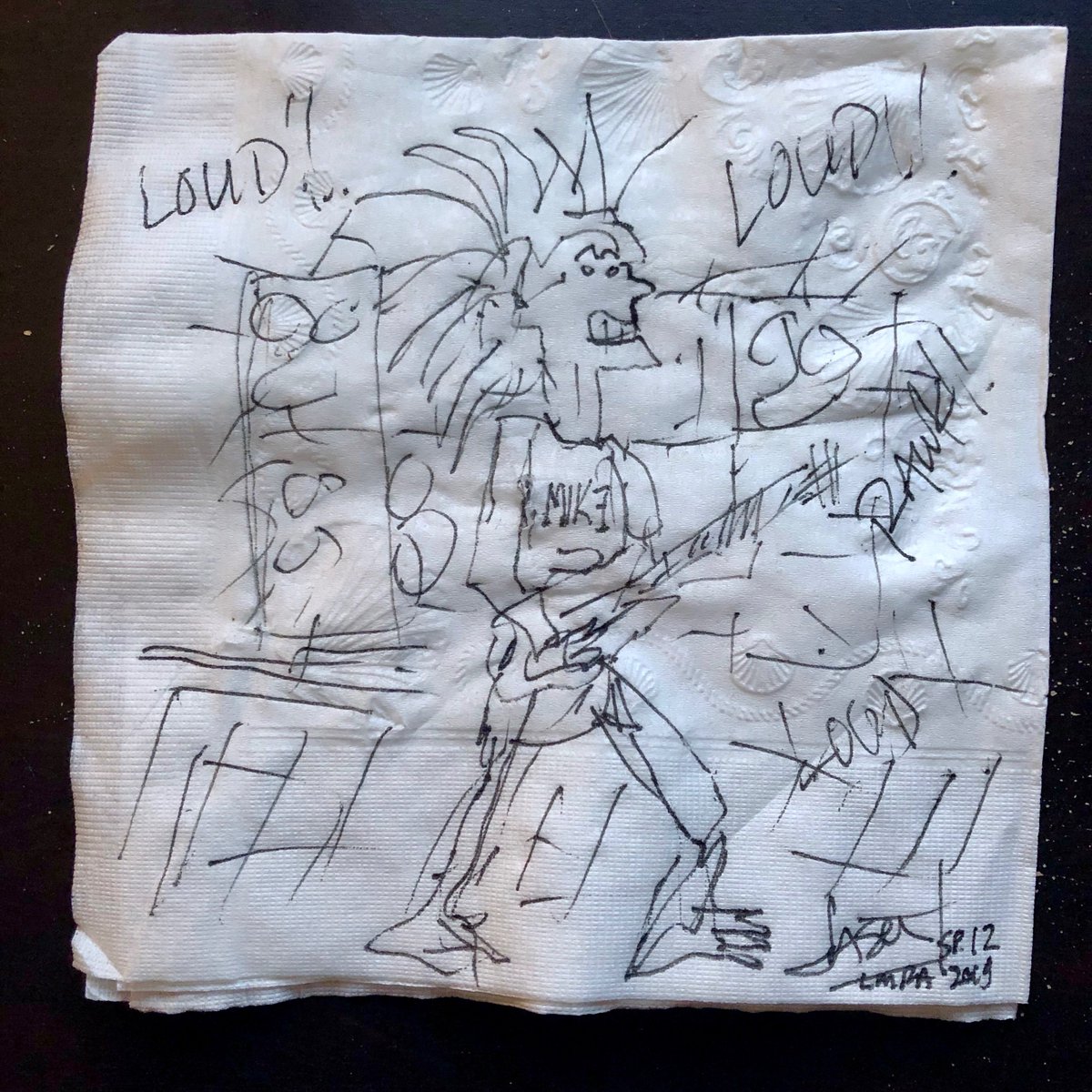 Jason Newsted of Metallica came in to the bar today w his beautiful wife Nicole. Both such sweet spirits. Loved them both! Wo my knowledge, Jason doodled this for me and left it w a generous tip. BTW, notice the "MIKE" he added to the shirt? He's a class act!