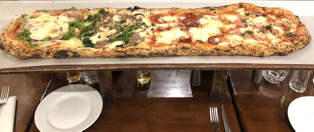 Amazing week with the HTB team. <a href="/hackthebox_eu/">Hack The Box</a> much ❤️ to everyone, even <a href="/hpylarinos/">Haris Pylarinos</a>. This 1 meter of pizza sums it up well.