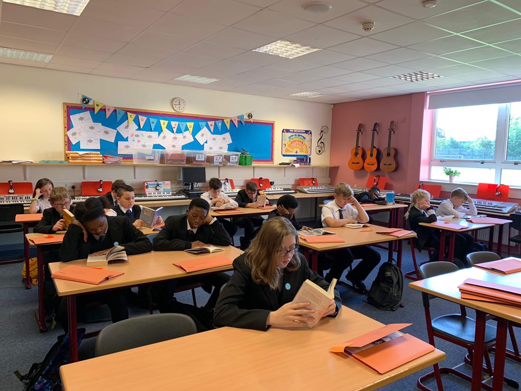 LiteracySMA's tweet photo. DEAR time in music for 1.1! 📖 📚 “An excellent way to start the day!” so says Mrs Smith! Reading regularly can greatly improve a young person’s attainment and we’re using lots of different methods to make it happen more often, including DEAR time! @StMungosAcademy https://t.co/wJe87WidTM