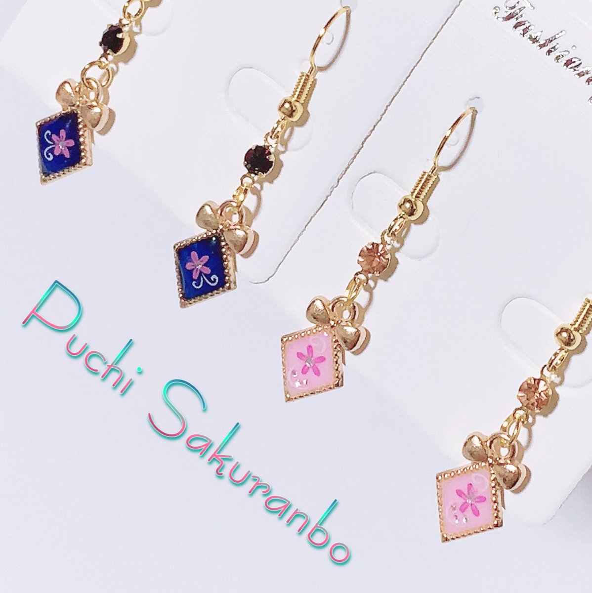 Puchi Sakuranbo Minneセール中 りぼんとお花柄の菱形ピアス ゆらゆらと揺れて可愛いです またまた 撮影に時間が掛かった これは 製作時間より写真撮る方が時間掛かってる気がする レジンピアス レジンアクセサリー Accessory ハンドメイド