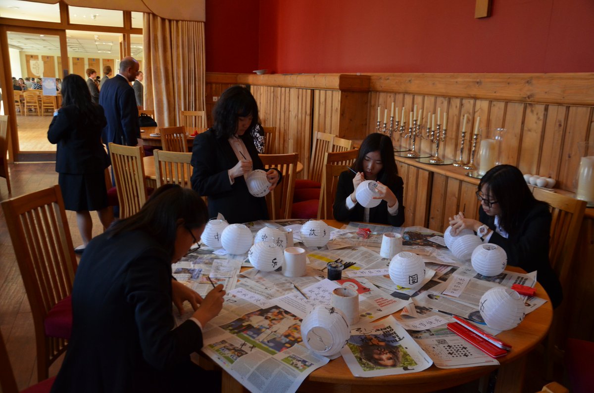 NewHallEAL's tweet photo. Our boarders @NewHallPetre @NewHallHawley  @NewHallDennett and @NewHallCampion thrilled that we put on a #MidAutumn party at lunch. Boarders and day students tucked into a Chinese buffet and got to grips with some wonderful calligraphy.

#BSiL #Boarding #StudyintheUK #NewHall https://t.co/RBRXcYmBsC