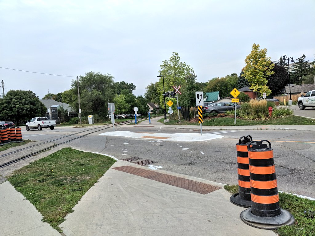 The pedestrian refuge is such an honest piece of infrastructure. It acknowledges a painted crosswalk wouldn't suffice because of the risk drivers pose, but also communicates a full signalled crossing (traffic lights) isn't feasible (for whatever reason). 

It's a gesture.