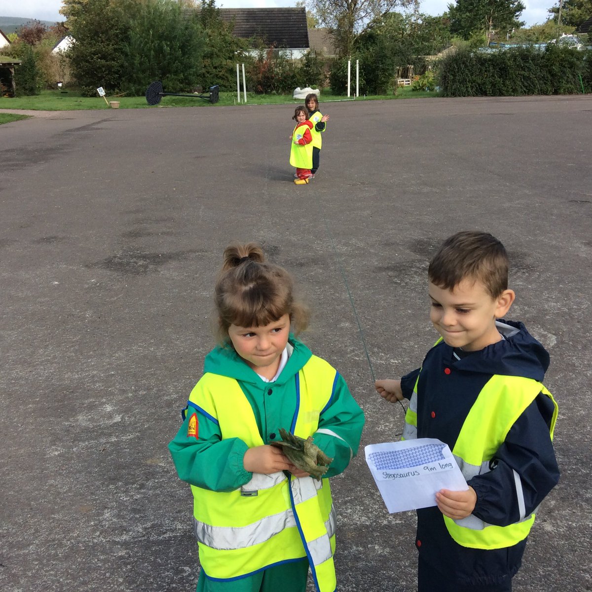 GatehseNursery's tweet photo. Mrs Carson took the children into the school playground to compare the lengths of the different dinosaurs we have been finding out about this week! #EarlyLevelMaths https://t.co/2YnDQoM6eD