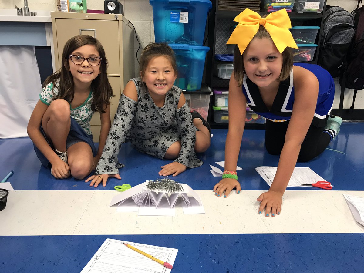 Building bridges with index cards. The girls were the first successful group to make a bridge that can hold weight! <a href="/FawnArea/">Fawn Area Elementary</a> #fawnarearocks