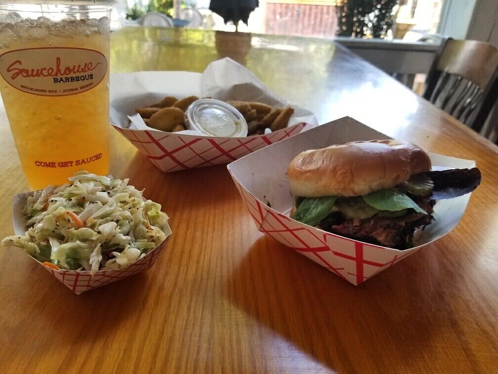 TGIF! Wanna kick-off your weekend the right way? Head into our restaurant or bar for some finger-lickin’ good BBQ! 📸: brisket sandwich, slaw, &amp; fried pickles (from the bar), w an arnold palmer! #friyay #tgif #getyourweekendon #my_athens