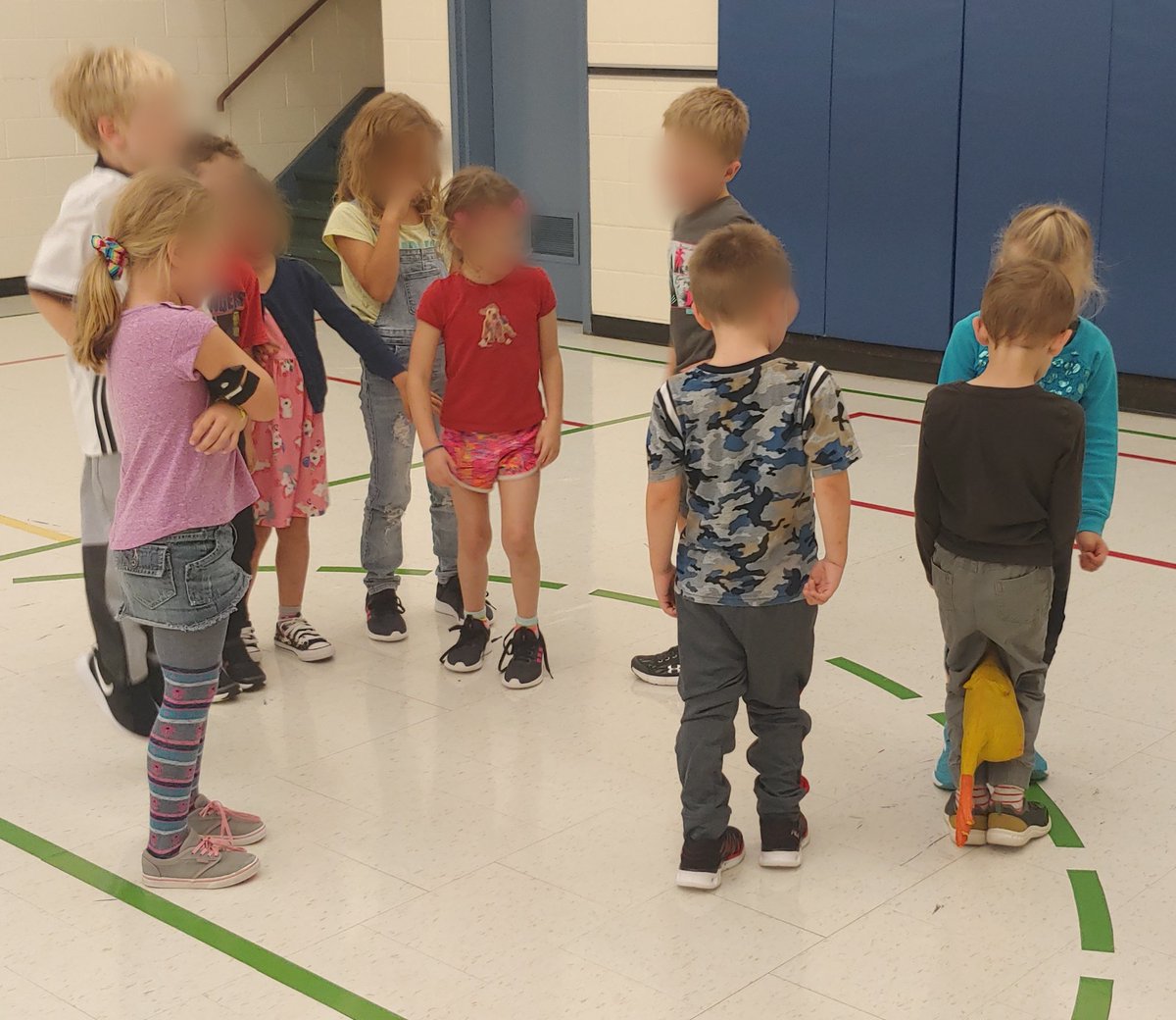 MissJaskula's tweet photo. Working on our teamwork, communication, and problem solving skills. Ss had to pass the chicken with their hands, elbows, and knees! Too funny. @EnniskillenPS https://t.co/8eKaXSe74s