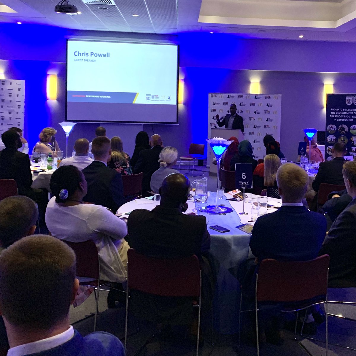 OxfordshireFA's tweet photo. Our guest speaker for the evening, Chris Powell takes to the stage #OFAawards https://t.co/7kNDMKm0Hz