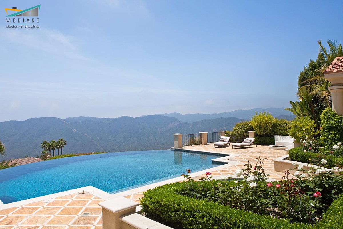 ModianoDesign's tweet photo. To infinity and beyond! Who wouldn’t want to relax by this luxurious infinity pool in the lounging area we staged? #HomeStaging #HomeRenovation https://t.co/RwHPvnODFU