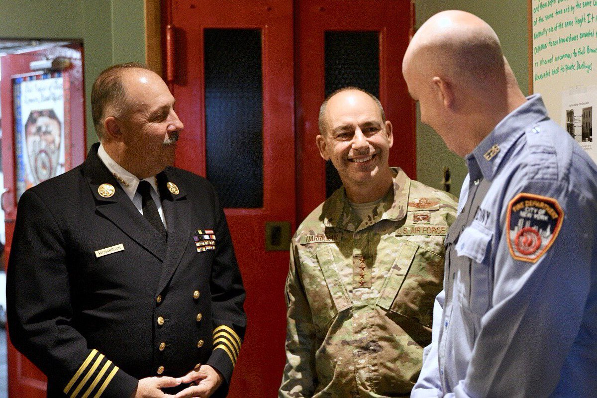 FDNY's tweet photo. Thank you, @USAirForce General Jeffrey Harrigian, for presenting a flag and certificate to #Engine28 and #Ladder11 in remembrance of US Air Force Master Sgt. and FDNY Lt. Christopher Raguso; and US Air Force Major and FDNY Fire Marshal Christopher “Tripp” Zanetis. https://t.co/PYGc7rEY65